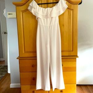 Off the shoulder white jumpsuit. Brand new with tags.